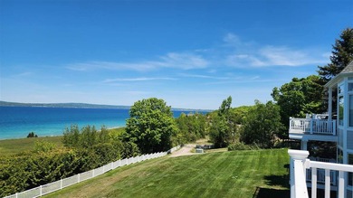 Perched above the Lake Michigan shoreline, this stunning - photo 4