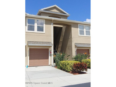 Check out this BEAUTIFULLY MAINTAINED condo that is centrally - photo 1