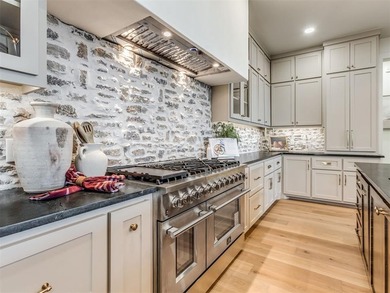 Completed in 2025, this exceptional custom lake home in the - photo 11
