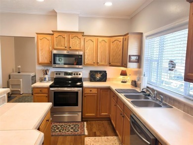 This beautifully maintained manufactured home boasts 10 ft