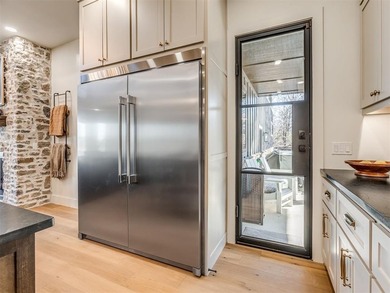 Completed in 2025, this exceptional custom lake home in the - photo 13