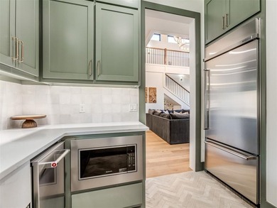 Completed in 2025, this exceptional custom lake home in the - photo 16