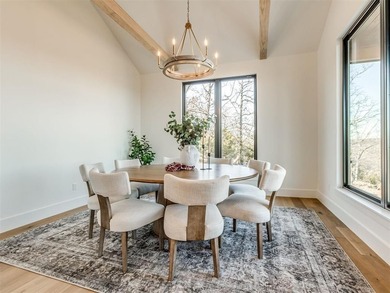 Completed in 2025, this exceptional custom lake home in the - photo 17