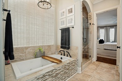 Tucked away on a beautifully landscaped cul-de-sac lot in the - photo 18
