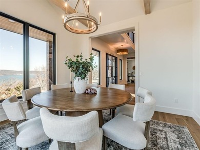 Completed in 2025, this exceptional custom lake home in the - photo 18
