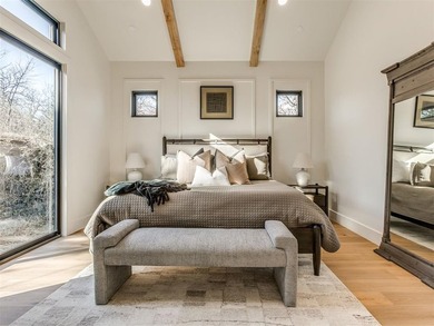 Completed in 2025, this exceptional custom lake home in the - photo 19