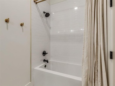 Completed in 2025, this exceptional custom lake home in the - photo 30