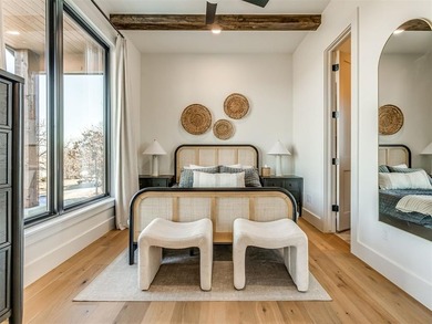 Completed in 2025, this exceptional custom lake home in the - photo 31
