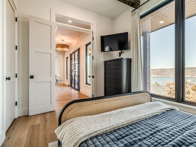 Completed in 2025, this exceptional custom lake home in the - photo 32
