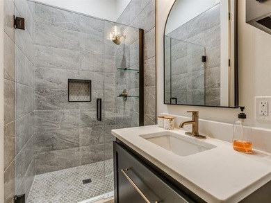 Completed in 2025, this exceptional custom lake home in the - photo 33