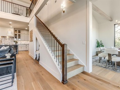 Completed in 2025, this exceptional custom lake home in the - photo 36