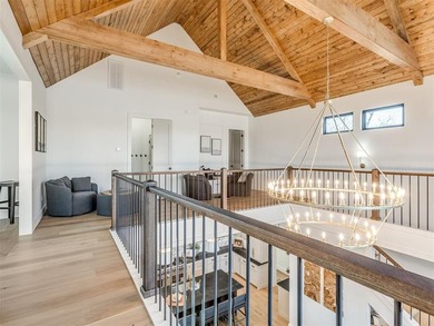 Completed in 2025, this exceptional custom lake home in the - photo 38