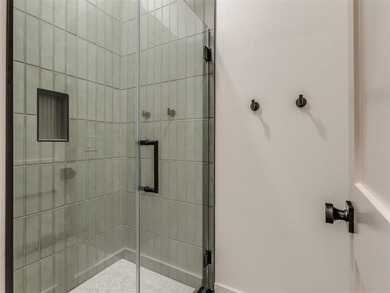 Completed in 2025, this exceptional custom lake home in the - photo 42