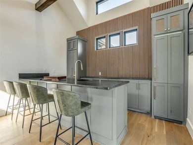 Completed in 2025, this exceptional custom lake home in the - photo 44