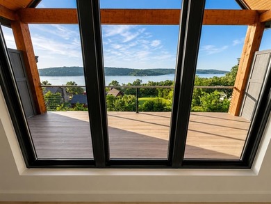 Completed in 2025, this exceptional custom lake home in the - photo 47