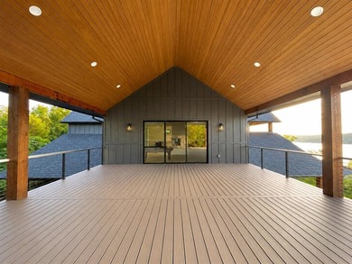 Completed in 2025, this exceptional custom lake home in the - photo 50