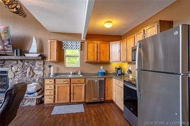 Lake living doesn't get much better than this! Nestled in a - photo 25