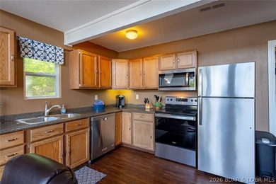 Lake living doesn't get much better than this! Nestled in a - photo 26