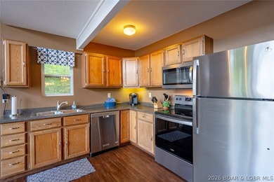 Lake living doesn't get much better than this! Nestled in a - photo 27