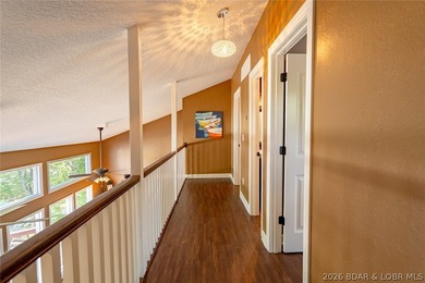 Lake living doesn't get much better than this! Nestled in a - photo 34