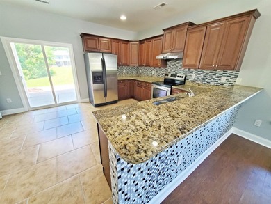 Bright end-unit townhome featuring a first-floor primary suite - photo 17