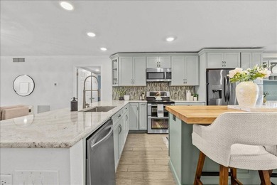 BOAT SLIP/ LIFT - PRIVATE GARAGE - FULLY RENOVATED WATERFRONT - photo 8