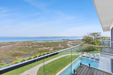 Now available, this extraordinary South of the Highway bayfront - photo 12