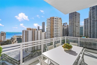 Discover refined Brickell Key living in this exceptional corner