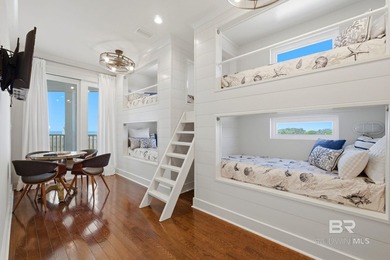 Built in 2023, this custom 5BR, 5.5BA Gulf-front residence - photo 30