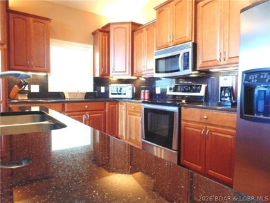 LUXURY SUMMER PLACE CONDO at Lake of the Ozarks - TURNKEY! This - photo 21