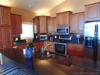 LUXURY SUMMER PLACE CONDO at Lake of the Ozarks - TURNKEY! This - photo 23