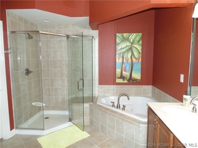 LUXURY SUMMER PLACE CONDO at Lake of the Ozarks - TURNKEY! This - photo 29