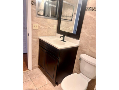This 1st floor unit has a freshly painted interior and is a safe - photo 16