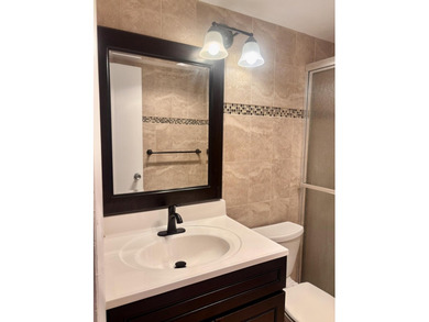 This 1st floor unit has a freshly painted interior and is a safe - photo 18