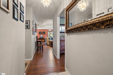 Set on 3.55 waterfront acres, this one-level custom home offers