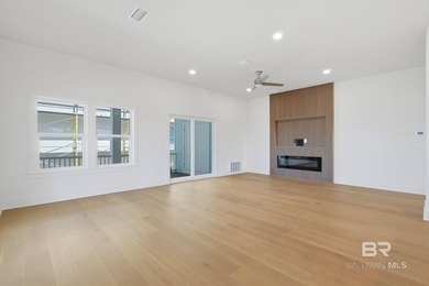 Newly completed in 2026, this stunning corner-lot beach home - photo 11