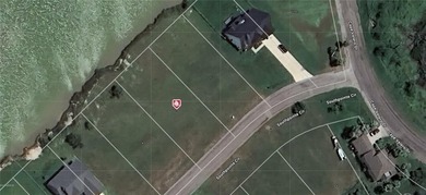 This amazing spacious waterfront lot in the well-established - photo 1
