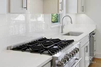 Newly completed in 2026, this stunning corner-lot beach home - photo 15
