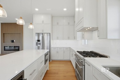 Newly completed in 2026, this stunning corner-lot beach home - photo 18