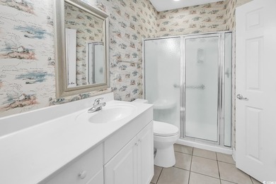 Welcome to this spacious and inviting three-bedroom, two-bath