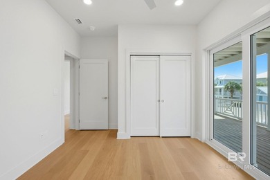Newly completed in 2026, this stunning corner-lot beach home - photo 22