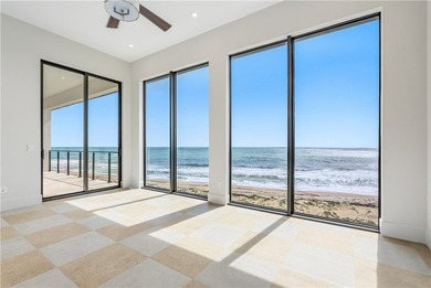Newly constructed directly on the Atlantic, this home sets a new - photo 24