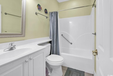 Welcome to this spacious and inviting three-bedroom, two-bath