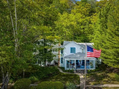 Situated along the north shore of Little Traverse Bay on Lake - photo 3