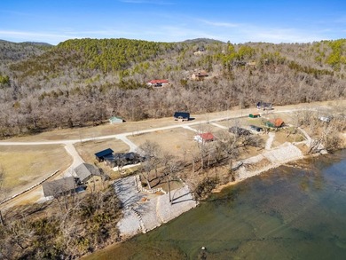 Riverfront Property in the Ozarks! 0.74 acres m/l 121.57 ft of - photo 4