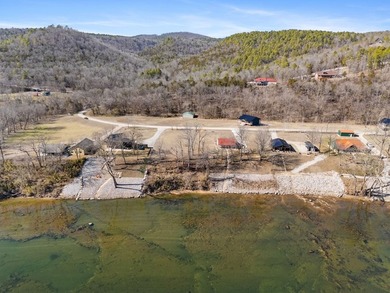 Riverfront Property in the Ozarks! 0.74 acres m/l 121.57 ft of - photo 5