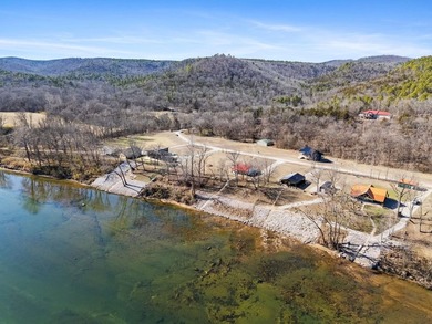 Riverfront Property in the Ozarks! 0.74 acres m/l 121.57 ft of - photo 6