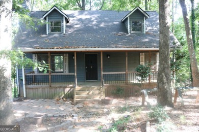 Lake Home For Sale in Flowery Branch, Georgia