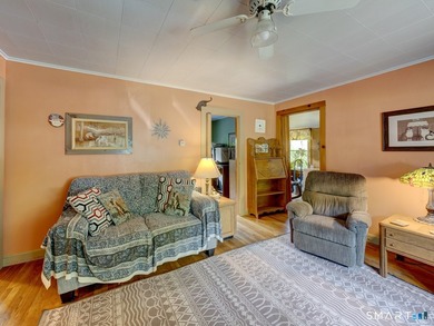 Charming 2-bedroom ranch-style home on a lovely lake offers a - photo 13