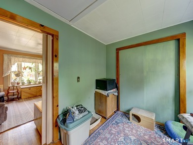 Charming 2-bedroom ranch-style home on a lovely lake offers a - photo 16